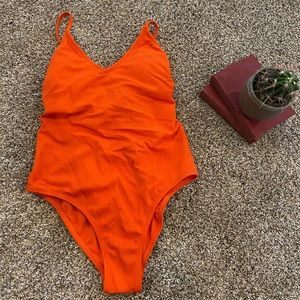 NWOT. High cut orange swimsuit.